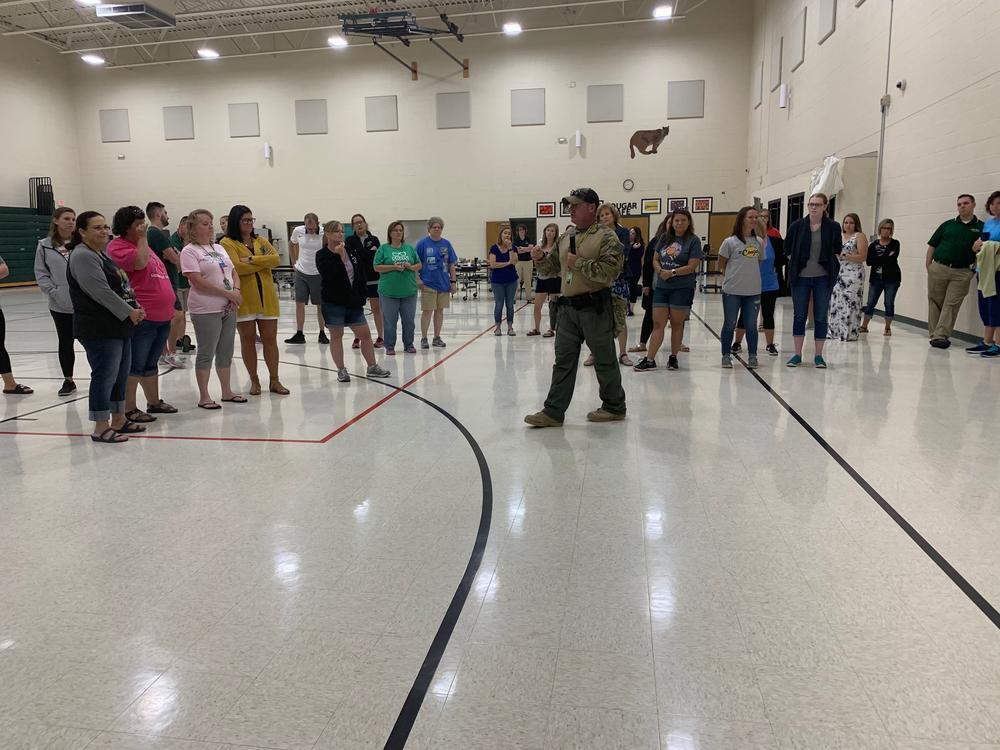active shooter training with students in gym