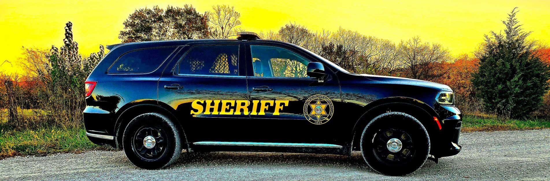 Sheriff patrol SUV with sunset in background